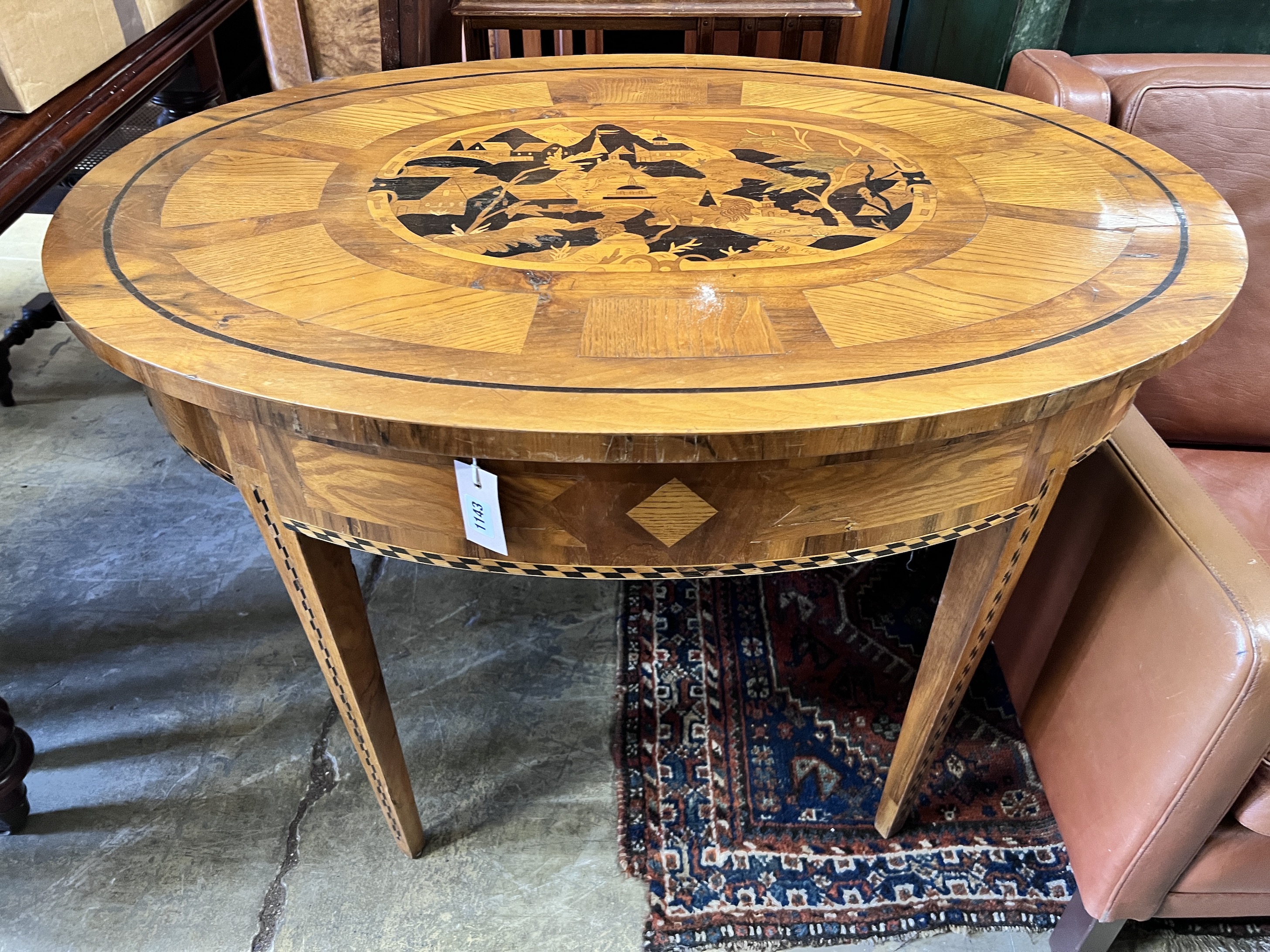 A 19th century Continental marquetry inlaid centre table with frieze drawer, width 103cm